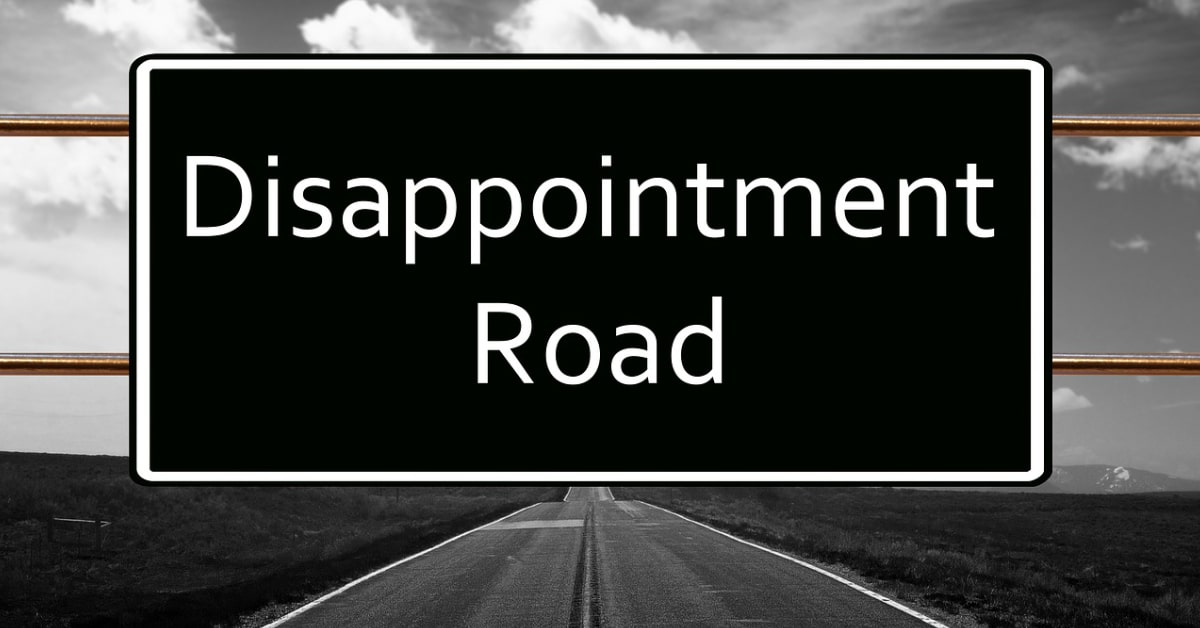 Road to disappointment sign